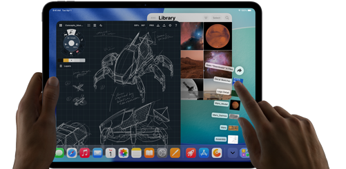 iPad Pro, space black color, left hand holding device, right hand pointing gesturing to manipulate multiple open app windows, a drawing app with sketches of mechanical designs, photos library of planets and space images, downloads folder files fanned out