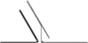 2 iPad Pro devices attached to Magic Keyboard, side exterior, thin profile, space black color with speakers and USB-C port, tilted half open, silver color, open, tilted back showing the keyboard's floating cantilever design, speakers and microphone