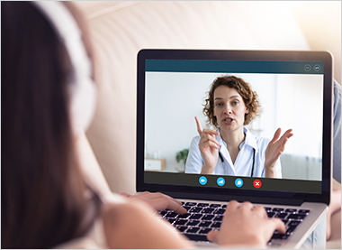 Photo of an at-home virtual visit with docto