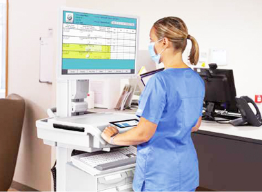 Telehealth: doctor showing patient info on a tablet